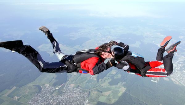 parachuting, jump from a plane, adventure, couple, kiss