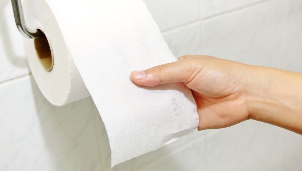 toilet paper, woman using toilet paper