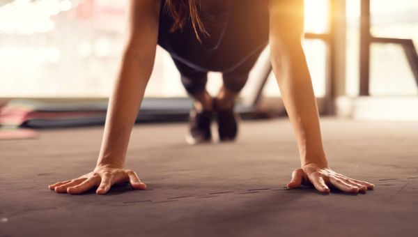 woman doing push-ups, gym, working out, fitness