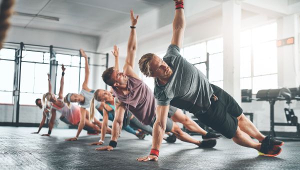 The health benefits of working out with a crowd