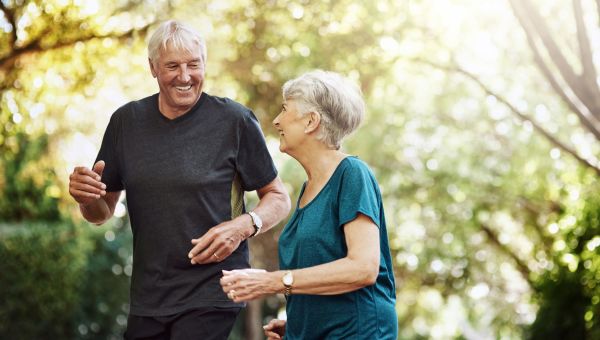 Senior couple jogging together