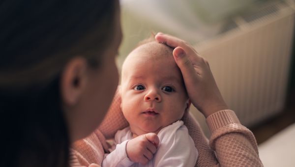 Woman holding infant