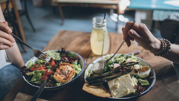 Couple eating health salads