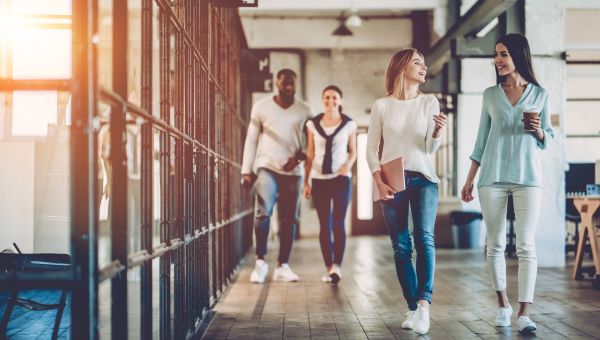 Office employees walking together