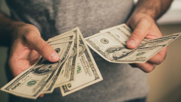 man holding money