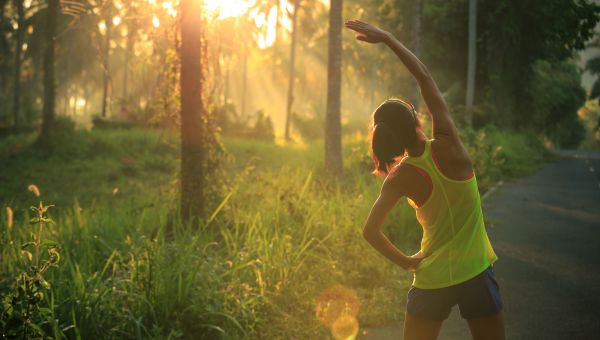 Woman stretching outdoors