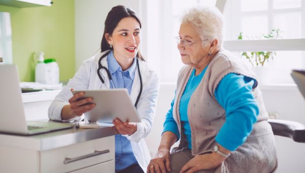 Someone discussing a weight loss plan with their healthcare provider