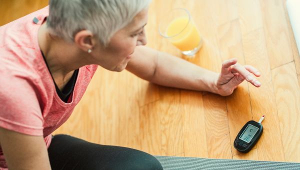 woman checking blood sugar