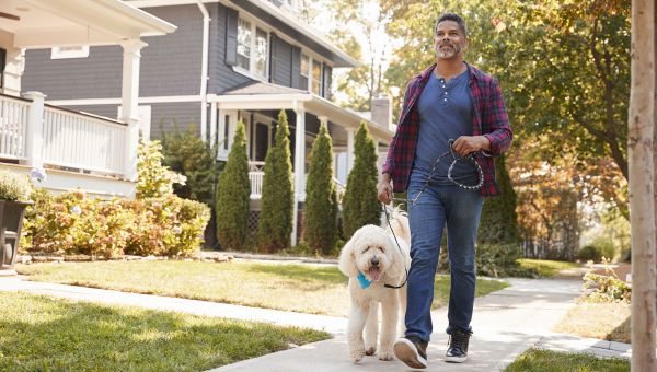 man walking his dog