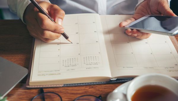 man using calendar