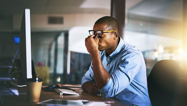 Stressed out male office employee