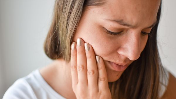 woman with jaw pain