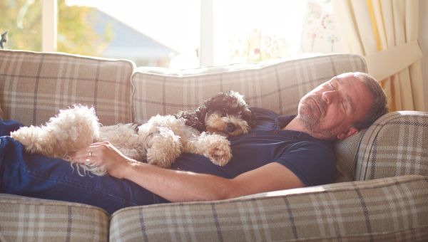 man sleeping on the couch