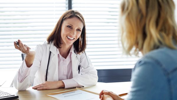 doctor speaking with patient