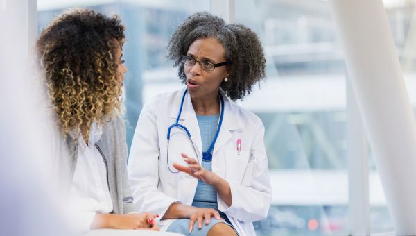 doctor speaking with patient