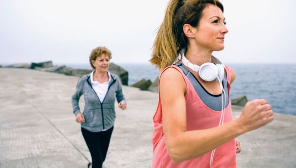 friends running on the beach
