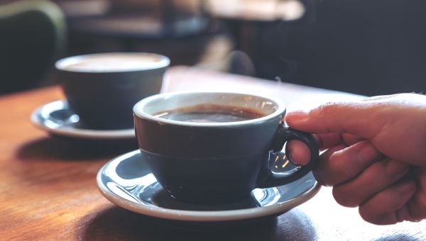 view of a mug of hot tea on a cafe table