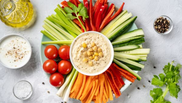 platter of vegetable sticks and hummus