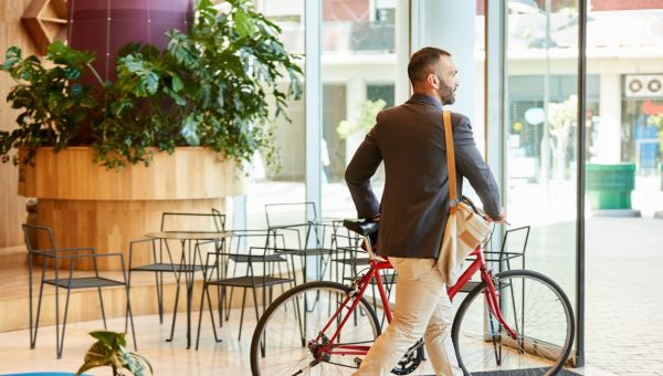 man leaving office building