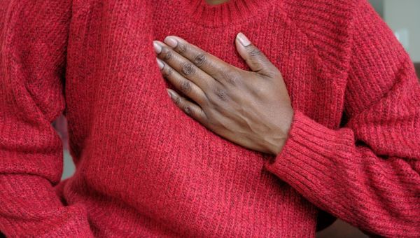 someone holding their chest