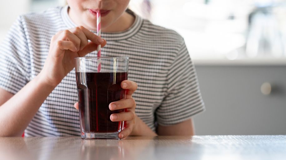 woman drinking soda