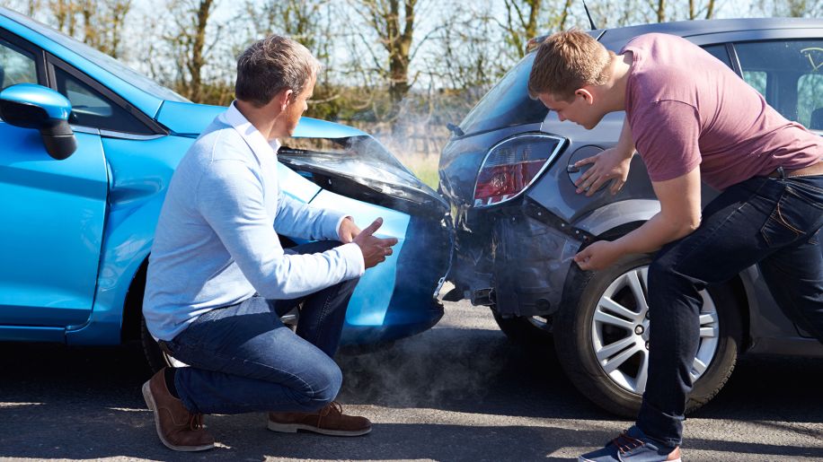 Two drivers arguing following a car accident