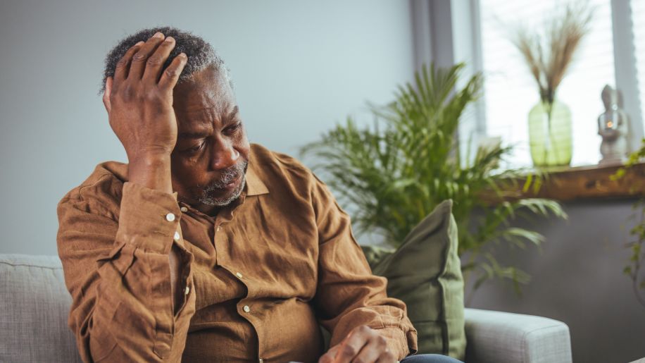depressed man on his couch