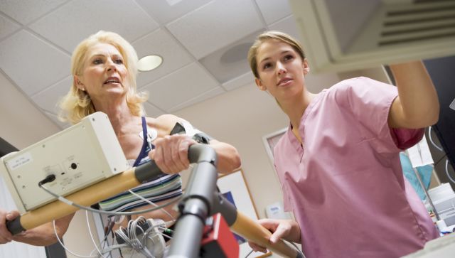 Nurse With Patient During Health Check