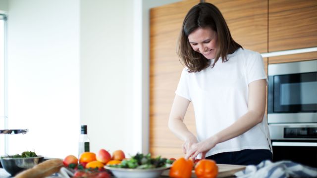 Woman chopping vegetables