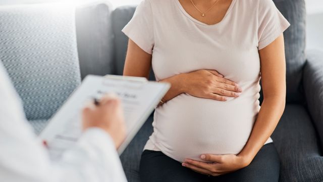 pregnant woman with doctor