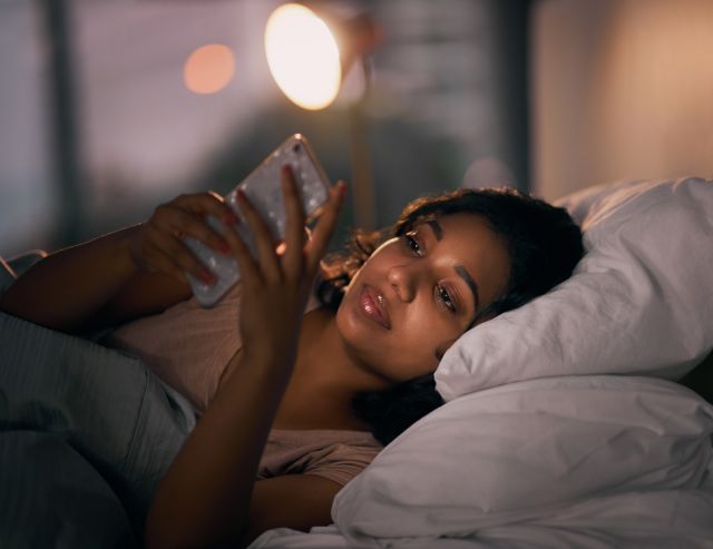 women with insomnia in bed