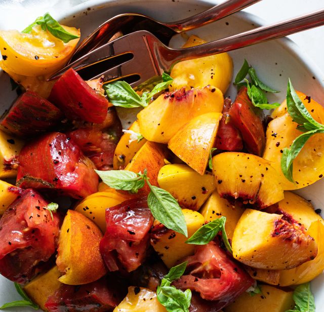 Tomato and peach salad in a bowl