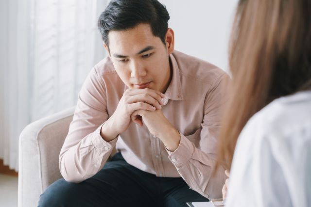 person talking to a doctor