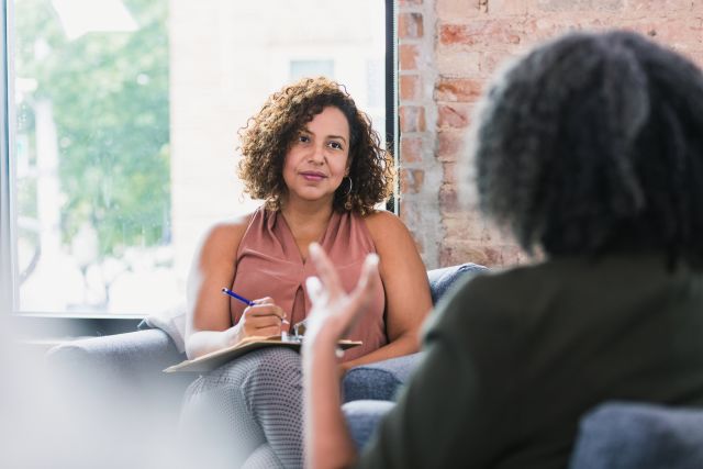 therapy session with two women