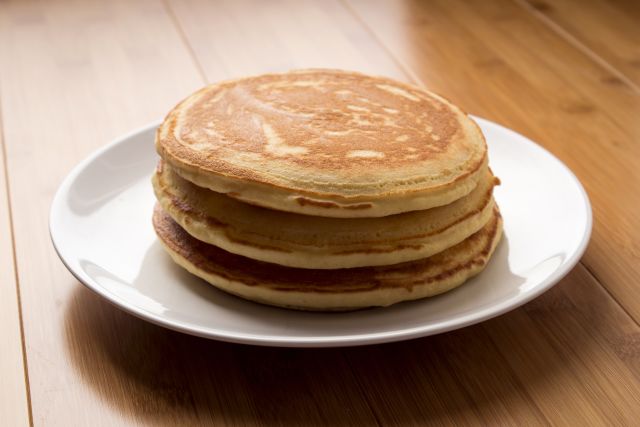 a stack of three basic pancakes