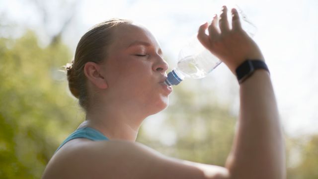 Thirsty woman with undiagnosed type 2 diabetes drinking water
