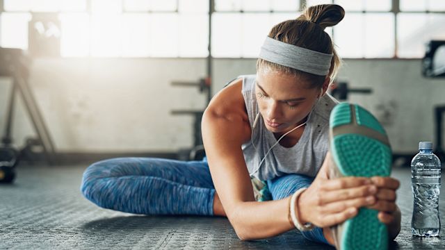 Woman stretching before a workout