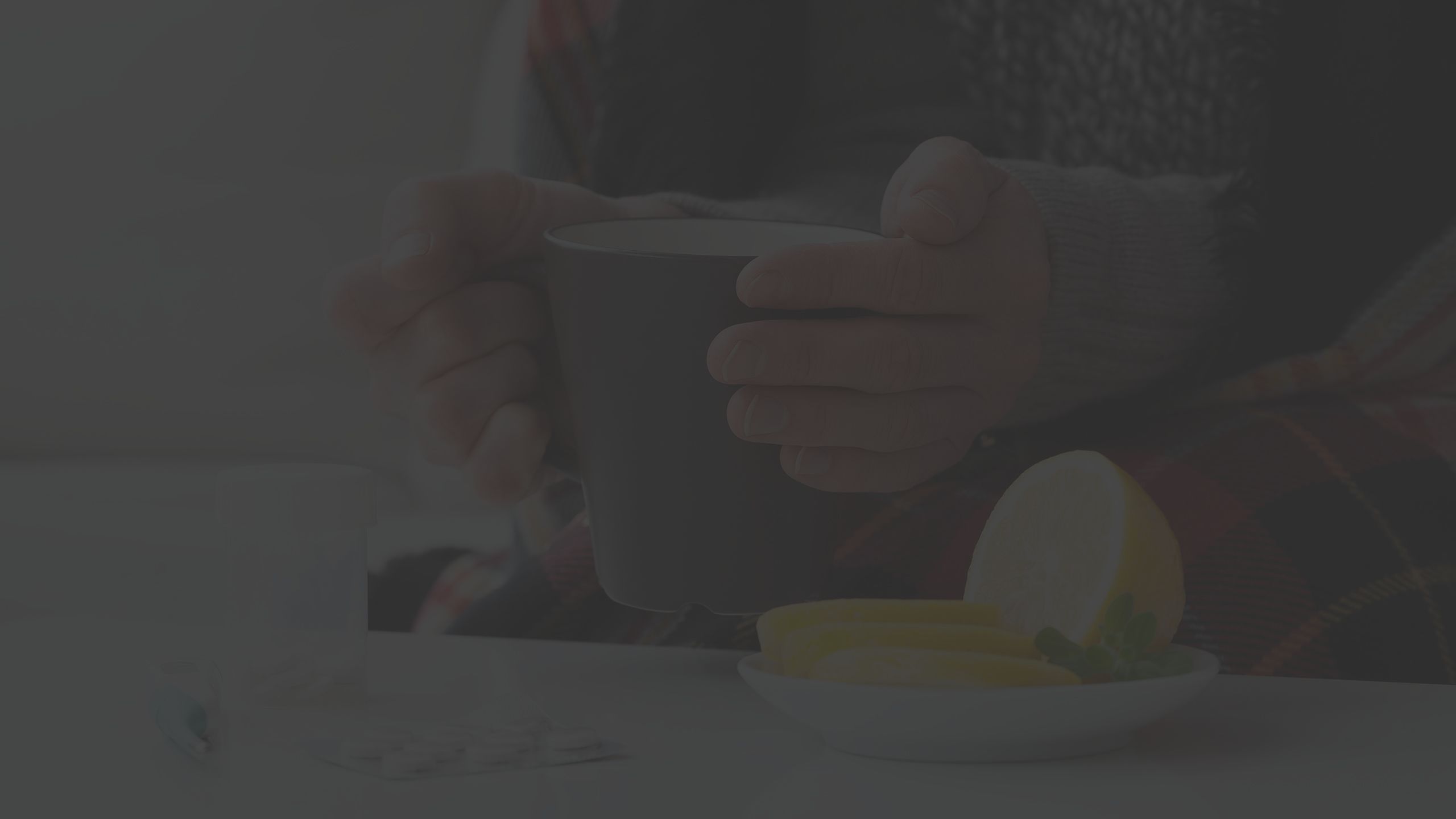 hands holding mug, mug, tea, lemons, medicine