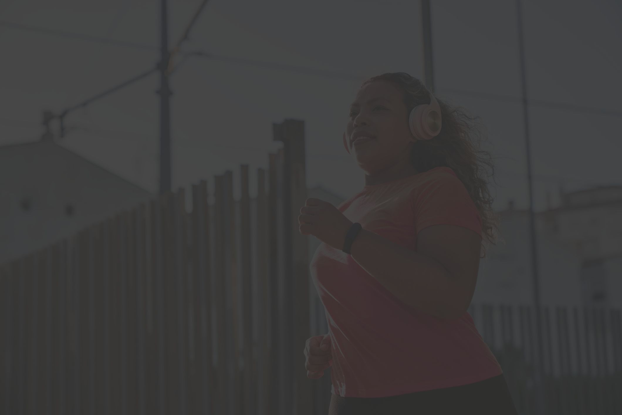 someone running with headphones on 