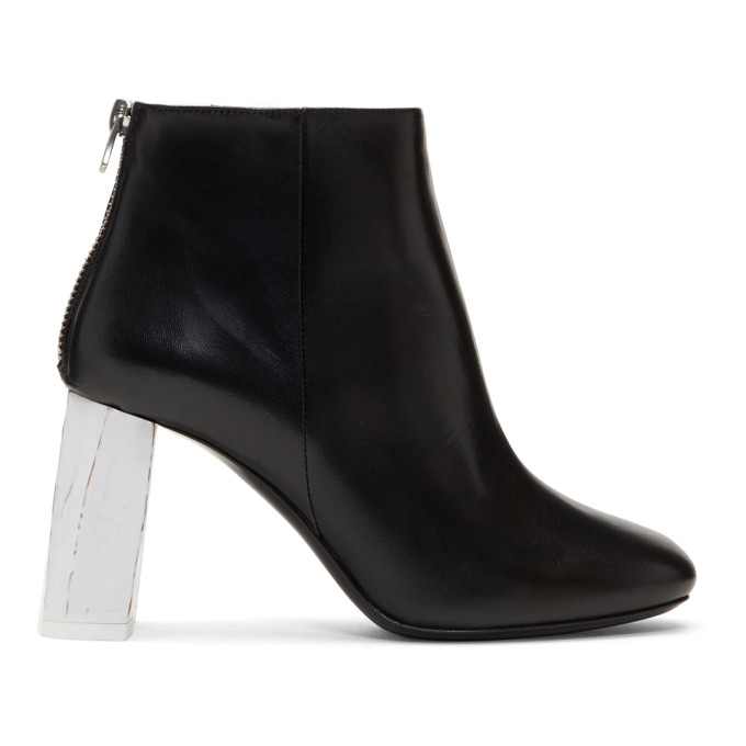 Click to view more detailed imagery on our partner's website Acne Studios 'Claudine' Colourblock Leather Ankle Boots In Black