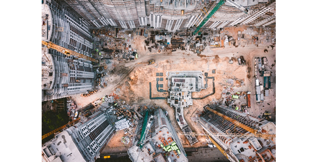 Private Takings of Land for Urban Redevelopment: A Tale of Two Cities
