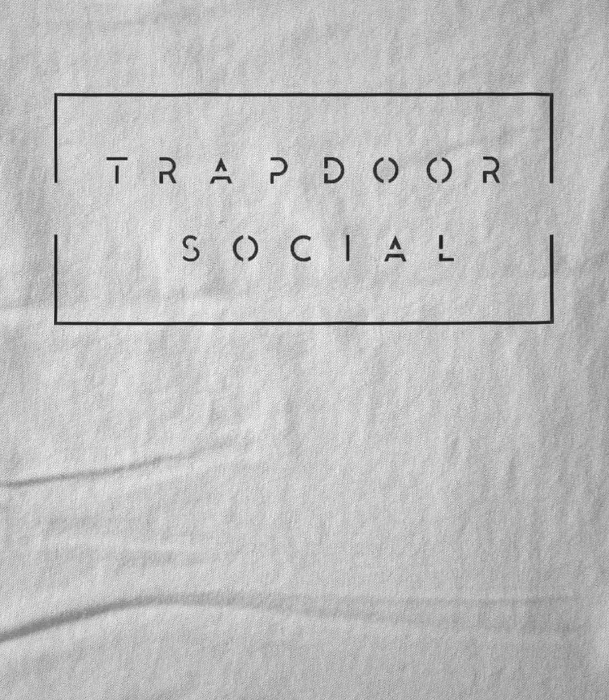 Trapdoor social white band logo 1476398886