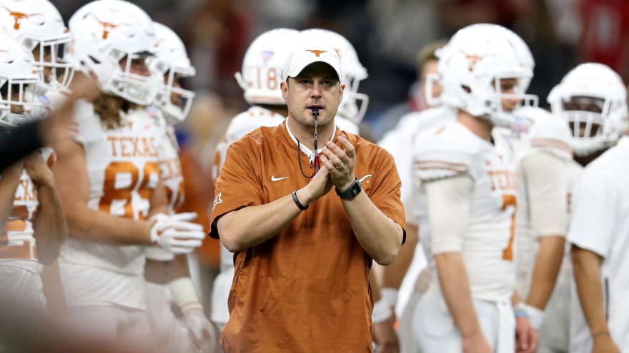 Watch Tom Herman Headbutts His Player Without Helmet Before